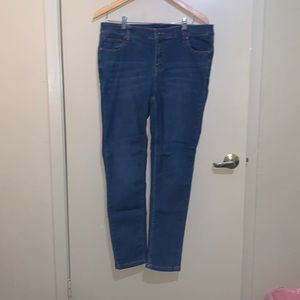 Blue jeans with stitching on the back pocket